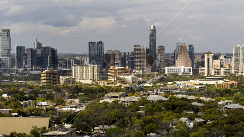 The city's skyline on a cloudy day, Downtown Austin, Texas Aerial Stock Photo DXP002_103_0013 | Axiom Images