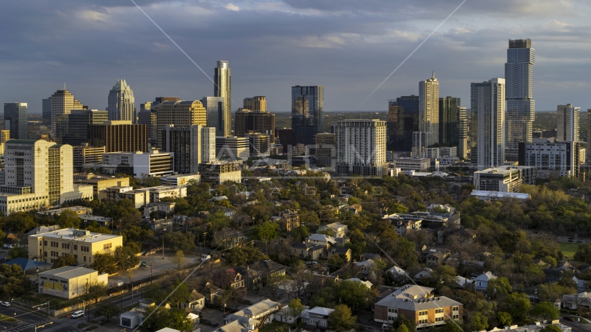 Office buildings and skyscrapers at sunset in Downtown Austin, Texas Aerial Stock Photo DXP002_105_0004 | Axiom Images