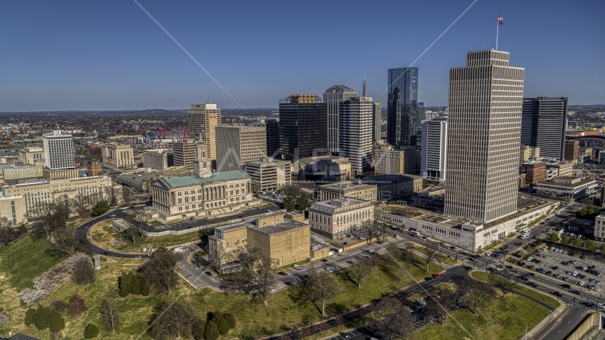 A view of the Tennessee State Capitol, skyscrapers, and Tennessee Tower in Downtown Nashville, Tennessee Aerial Stock Photo DXP002_114_0004 | Axiom Images