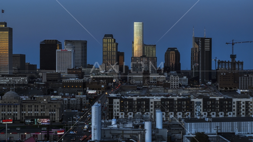 The city's skyline seen from apartments at twilight in Downtown Nashville, Tennessee Aerial Stock Photo DXP002_115_0001 | Axiom Images