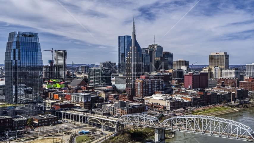 AT&T Building near bridge and Cumberland River in Downtown Nashville, Tennessee Aerial Stock Photo DXP002_116_0004 | Axiom Images