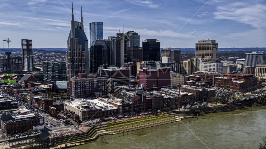 The city's skyline overlooking the Cumberland River, Downtown Nashville, Tennessee Aerial Stock Photo DXP002_117_0004 | Axiom Images