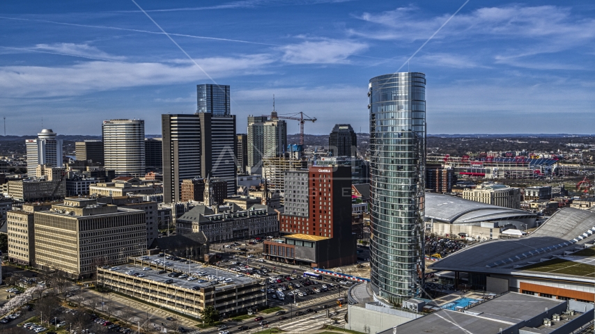 A view of the JW Marriott hotel, near skyscrapers in Downtown Nashville, Tennessee Aerial Stock Photo DXP002_118_0008 | Axiom Images