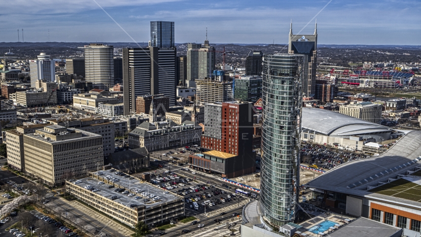 The JW Marriott hotel, skyscrapers in background in Downtown Nashville, Tennessee Aerial Stock Photo DXP002_118_0009 | Axiom Images