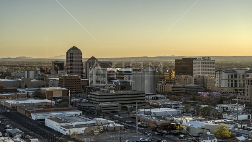 High-rise office buildings at sunset in Downtown Albuquerque, New Mexico Aerial Stock Photo DXP002_122_0007 | Axiom Images