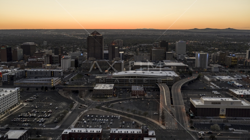 Albuquerque Plaza, Hyatt Regency, office high-rises at sunset in Downtown Albuquerque, New Mexico Aerial Stock Photo DXP002_123_0004 | Axiom Images