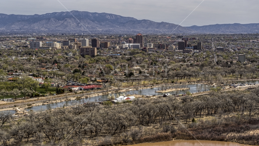 A view of high-rise office buildings seen from city park, Downtown Albuquerque, New Mexico Aerial Stock Photo DXP002_124_0004 | Axiom Images