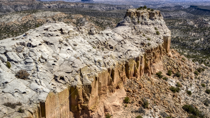 The top of a rugged desert mesa in New Mexico Aerial Stock Photo DXP002_133_0009 | Axiom Images