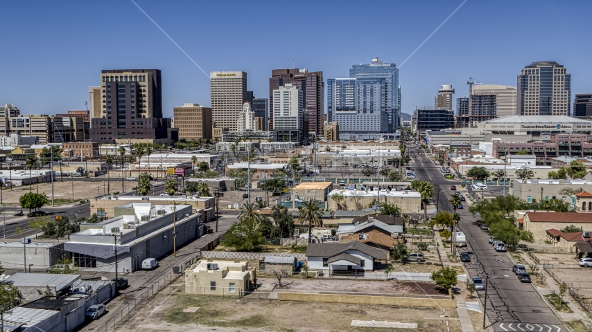 Tall office buildings at the end of Central Avenue, Downtown Phoenix, Arizona Aerial Stock Photo DXP002_136_0005 | Axiom Images