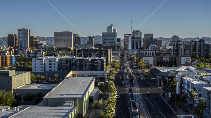 A view of high-rise office buildings in the distance in Downtown Phoenix, Arizona Aerial Stock Photo DXP002_138_0007 | Axiom Images