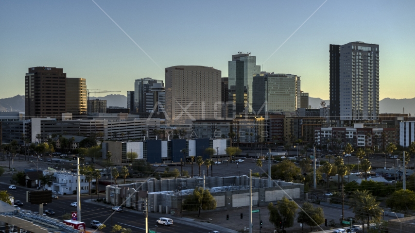 A hotel and tall office buildings at sunset in Downtown Phoenix, Arizona Aerial Stock Photo DXP002_138_0012 | Axiom Images