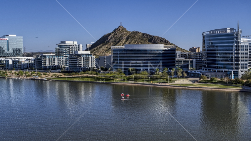 A riverfront condominium complex and modern office buildings in Tempe, Arizona Aerial Stock Photo DXP002_142_0007 | Axiom Images