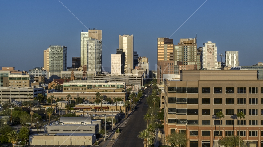 The city's skyline seen from state government offices at sunset in Downtown Phoenix, Arizona Aerial Stock Photo DXP002_143_0003 | Axiom Images