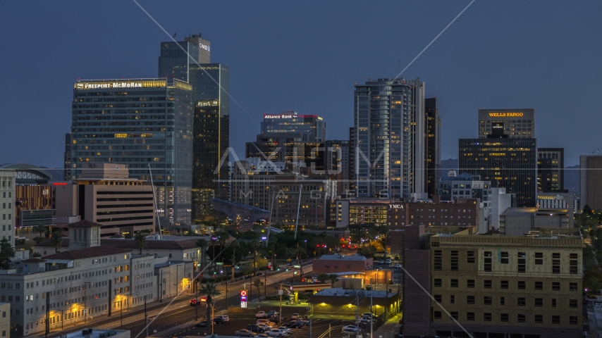 Towering high-rise office buildings at twilight, Downtown Phoenix, Arizona Aerial Stock Photo DXP002_143_0011 | Axiom Images