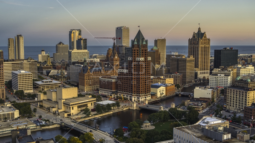 A riverfront office tower at twilight, Downtown Milwaukee, Wisconsin Aerial Stock Photo DXP002_150_0005 | Axiom Images