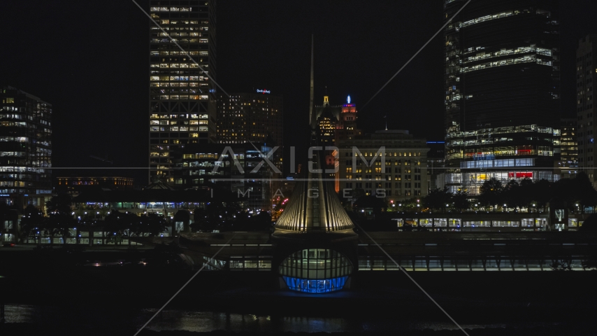 The lakefront museum near skyscrapers at night, Downtown Milwaukee, Wisconsin Aerial Stock Photo DXP002_157_0008 | Axiom Images