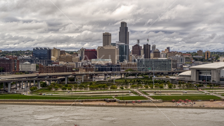 A view across the Missouri River toward the city skyline, Downtown Omaha, Nebraska Aerial Stock Photo DXP002_168_0002 | Axiom Images