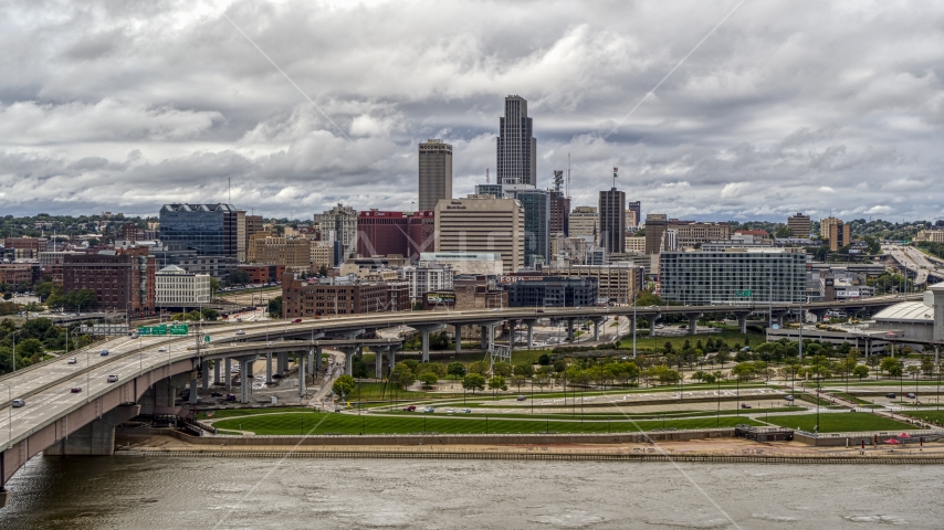 The city skyline and park across the river, Downtown Omaha, Nebraska Aerial Stock Photo DXP002_168_0003 | Axiom Images