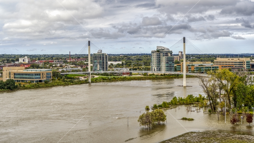 A pedestrian bridge spanning the Missouri River, Omaha, Nebraska Aerial Stock Photo DXP002_168_0004 | Axiom Images