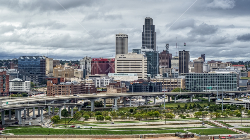 The city skyline seen from riverfront park, Downtown Omaha, Nebraska Aerial Stock Photo DXP002_169_0001 | Axiom Images