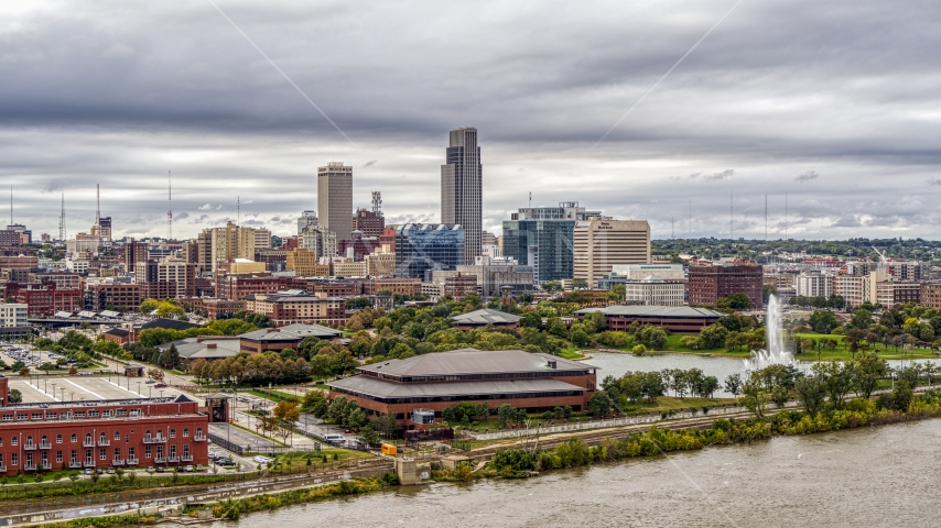 A fountain in a park and city's skyline, Downtown Omaha, Nebraska Aerial Stock Photo DXP002_169_0008 | Axiom Images