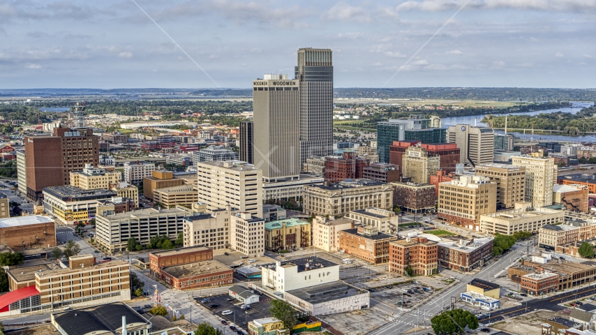 Skyscrapers towering over city buildings in Downtown Omaha, Nebraska Aerial Stock Photo DXP002_170_0004 | Axiom Images