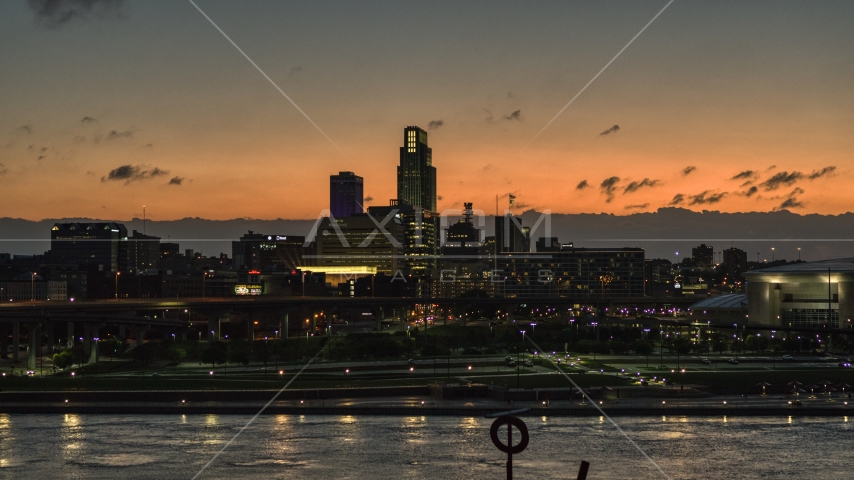 A view across the river toward the skyline at twilight, Downtown Omaha, Nebraska Aerial Stock Photo DXP002_173_0002 | Axiom Images