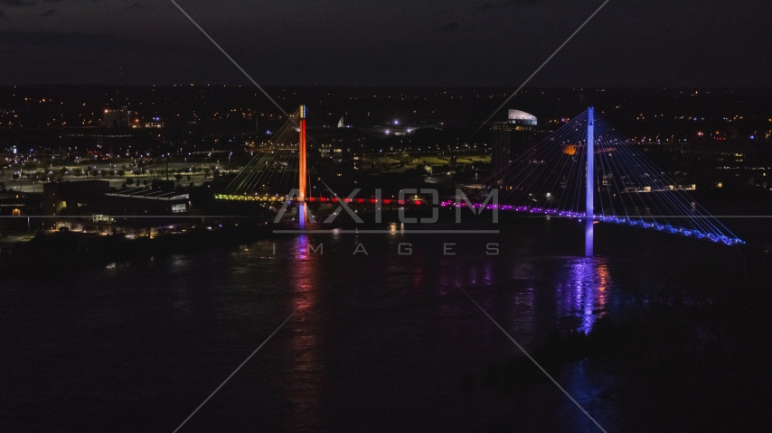 A pedestrian bridge spanning the Missouri River at night, Omaha, Nebraska Aerial Stock Photo DXP002_173_0005 | Axiom Images