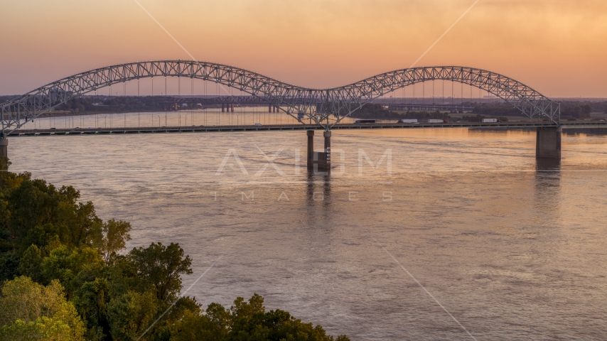 Traffic crossing the Hernando de Soto Bridge at sunset, Downtown Memphis, Tennessee Aerial Stock Photo DXP002_181_0001 | Axiom Images