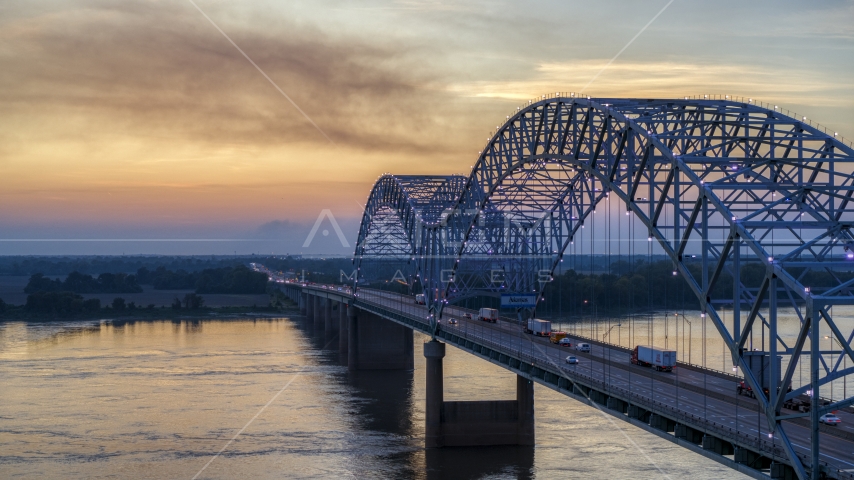 The Hernando de Soto Bridge at sunset, Arkansas Aerial Stock Photo DXP002_181_0005 | Axiom Images