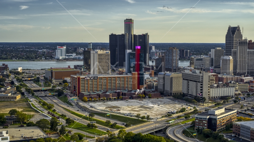 A view of tall skyscrapers and a hotel at sunset in Downtown Detroit, Michigan Aerial Stock Photo DXP002_191_0008 | Axiom Images