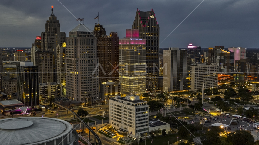 Tall skyscrapers at twilight in Downtown Detroit, Michigan Aerial Stock Photo DXP002_193_0001 | Axiom Images