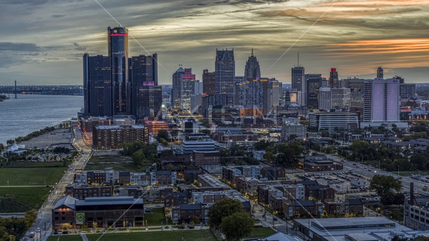 The city's towering skyscrapers at sunset, Downtown Detroit, Michigan Aerial Stock Photo DXP002_198_0001 | Axiom Images