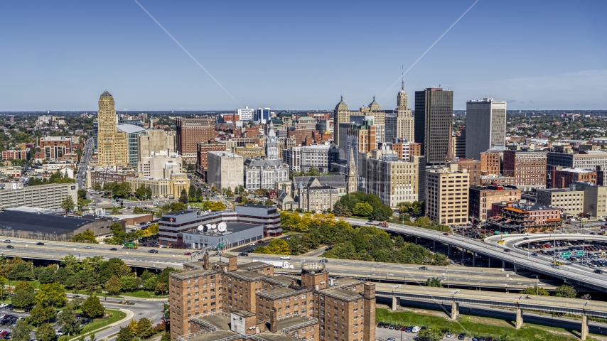 The city's skyline on the other side of the freeway, Downtown Buffalo, New York Aerial Stock Photo DXP002_200_0004 | Axiom Images