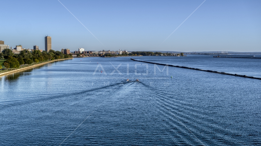 A rowboat and a speedboat on the lake near Buffalo, New York Aerial Stock Photo DXP002_203_0004 | Axiom Images