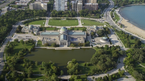 AX0001_009.0000165F - Aerial stock photo of The Museum of Science and Industry in Hyde Park, Chicago, Illinois