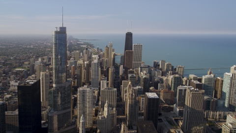 AX0001_027.0000109F - Aerial stock photo of Skyscrapers, including Trump Tower Chicago and John Hancock Center, Downtown Chicago, Illinois