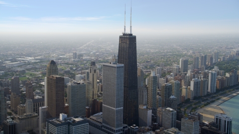 AX0001_039.0000055F - Aerial stock photo of A view of of John Hancock Center skyscraper, Downtown Chicago, Illinois