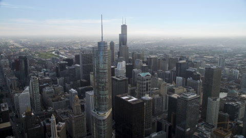 AX0001_040.0000228F - Aerial stock photo of Trump Tower Chicago, and Willis Tower in the distance, Downtown Chicago, Illinois