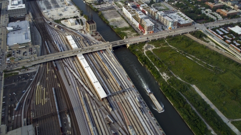 AX0001_078.0000000F - Aerial stock photo of Metra Railroad Yard and Chicago River, Downtown Chicago, Illinois