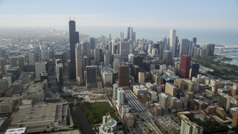 AX0001_078.0000280F - Aerial stock photo of Hazy Downtown Chicago, Illinois seen from south of the city