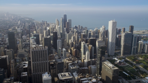 AX0001_114.0000207F - Aerial stock photo of Downtown Chicago buildings and skyscrapers on a hazy day, Illinois