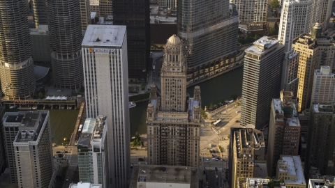 AX0001_116.0000156F - Aerial stock photo of The Kemper Building and 35 East Wacker skyscrapers in Downtown Chicago, Illinois