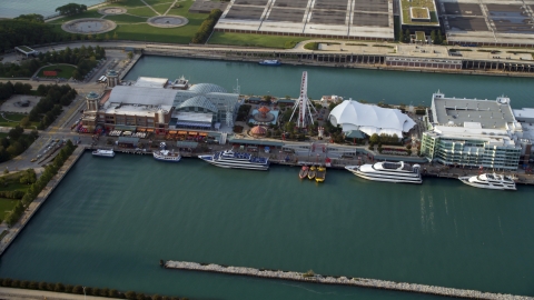 AX0001_122.0000207F - Aerial stock photo of A view of Ferris Wheel on Navy Pier in Chicago, Illinois