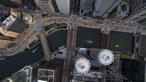 AX0001_137.0000181F - Aerial stock photo of A bird's eye view of N State Street in Downtown Chicago, and the Chicago River, Illinois