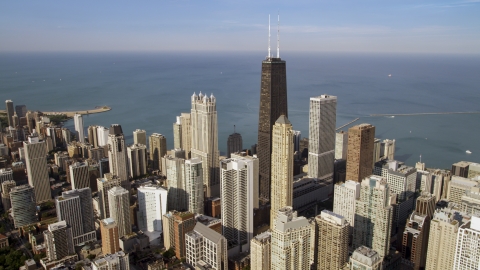 AX0002_011.0000284F - Aerial stock photo of John Hancock Center and Downtown Chicago skyscrapers, Illinois