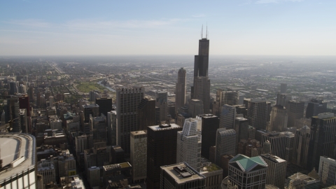 AX0002_027.0000419F - Aerial stock photo of A view of Willis Tower from across Downtown Chicago, Illinois