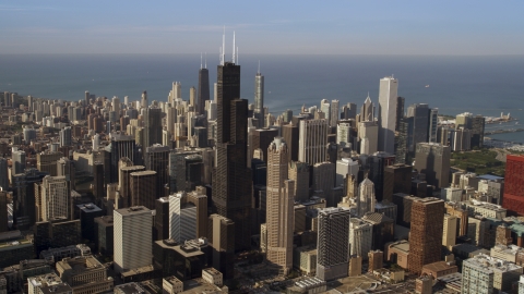 AX0002_064.0000209F - Aerial stock photo of Downtown Chicago cityscape and the iconic Willis Tower skyscraper, Illinois