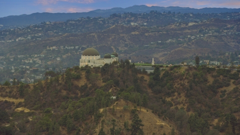 Griffith Observatory at twilight against the hills, California Aerial Stock Photos | AX0158_006.0000241