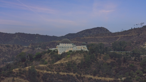 The front of the Griffith Observatory at twilight, Los Angeles, California Aerial Stock Photos | AX0158_009.0000242